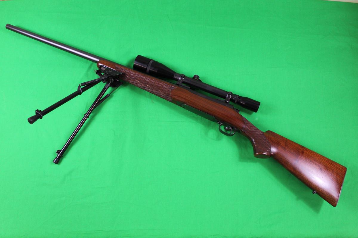 Winchester Model 70, caliber 220 Swift, s/n 453782.  Pre-64, this rifle has