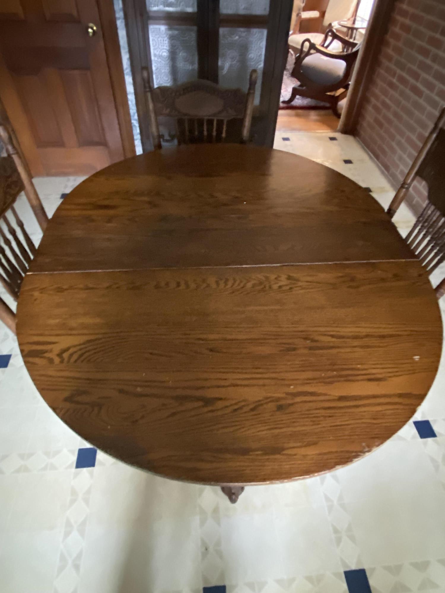 SINGLE PEDISTAL OAK TABLE AND FOUR CHAIRS
