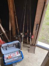FOUR FISHING POLE AND A TACKLE BOX