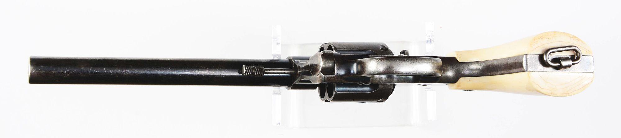 (C) Early Colt New Service Double Action Revolver with Ivory Grips (1907).