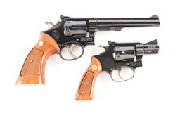 (C) Lot of 2: Boxed Smith & Wesson Double Action Revolvers.