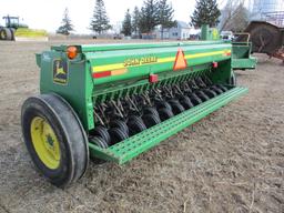 John Deere 450, 12' grain drill, 7" spacings, grass seeder, rubber press wheels, double disc