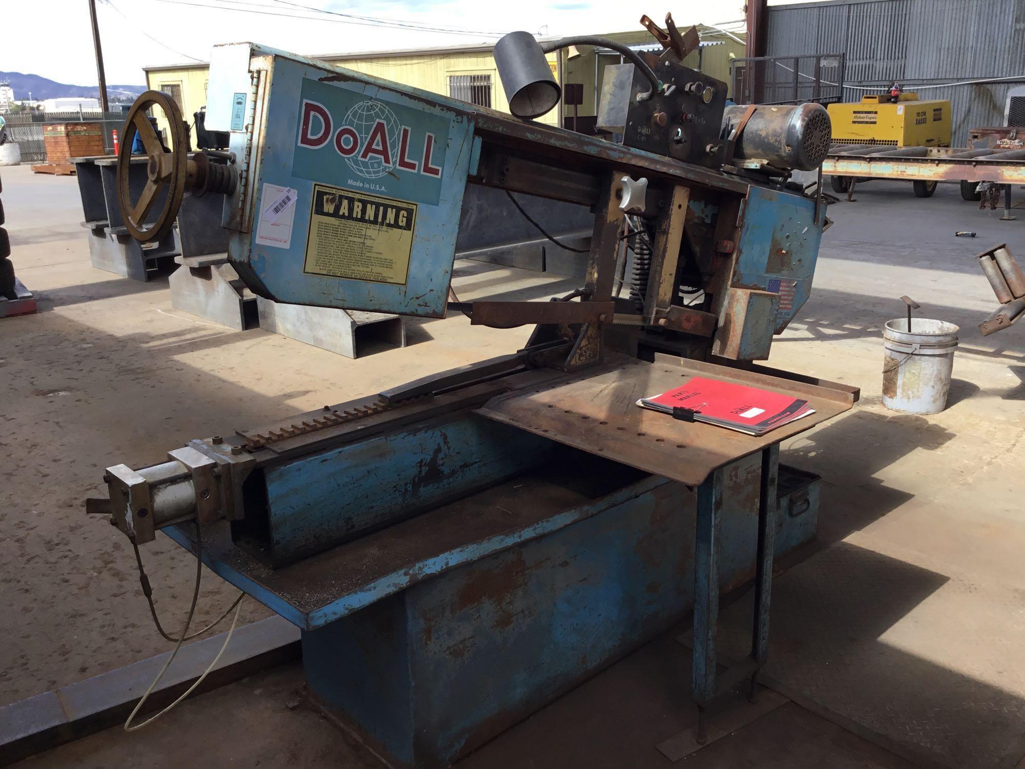 Vintage DOALL swivel head horizontal band saw With parts manual