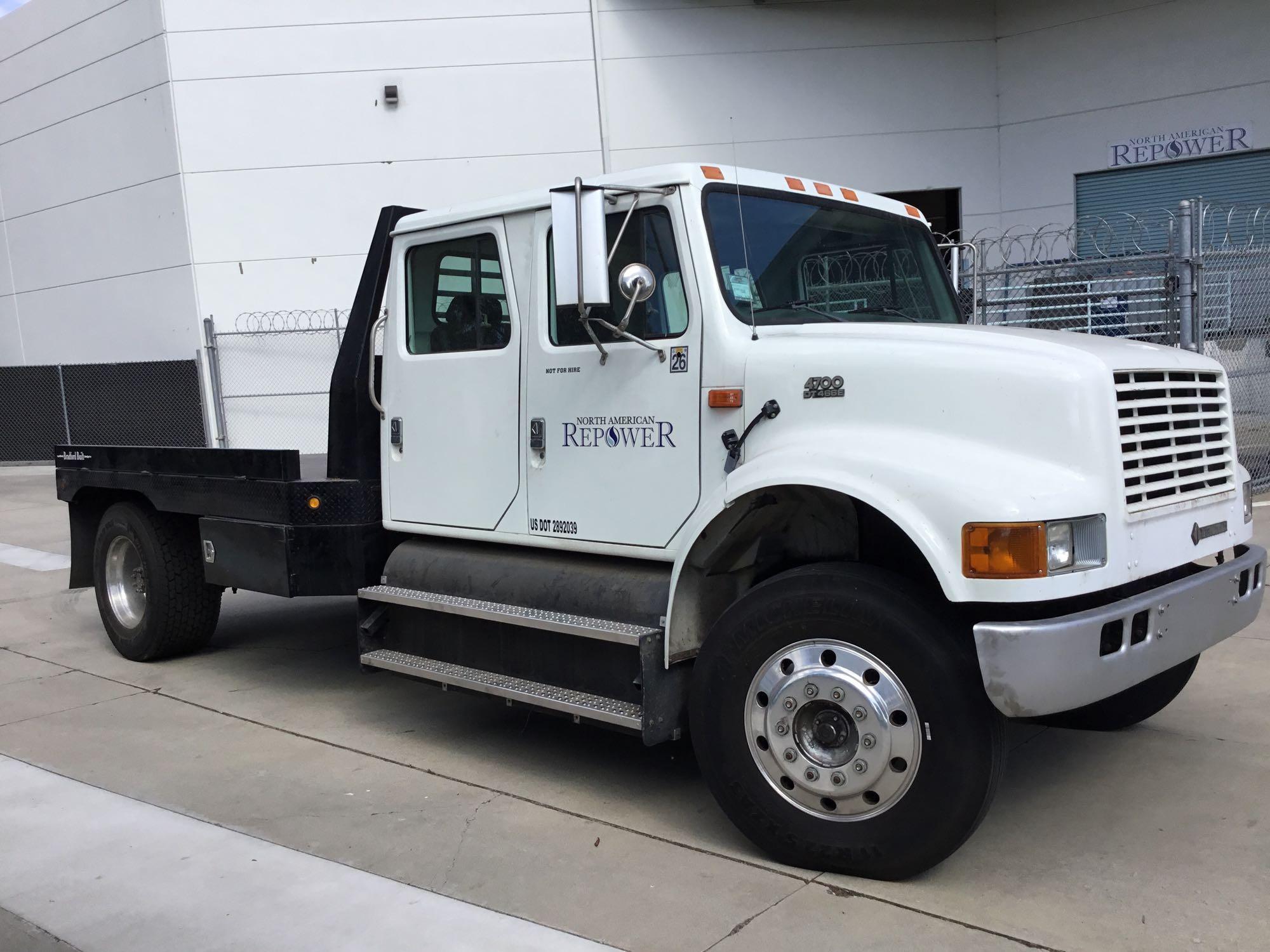 1998 International 4700 CNG 12ft Flat Bed Crew Cab Truck