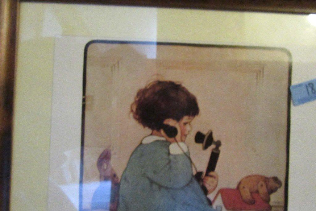 LARCHER COMBS PICTURE OF CHILD ON TELEPHONE