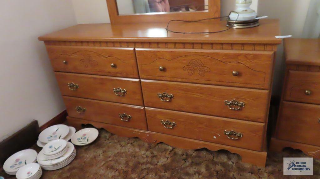 Oak finish full size bed, dresser with...mirror, chest of drawers and nightstand