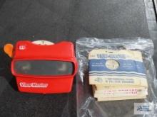 Assorted vintage Viewmaster reels with red Viewmaster