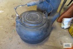 Cast iron teapot and small milk can