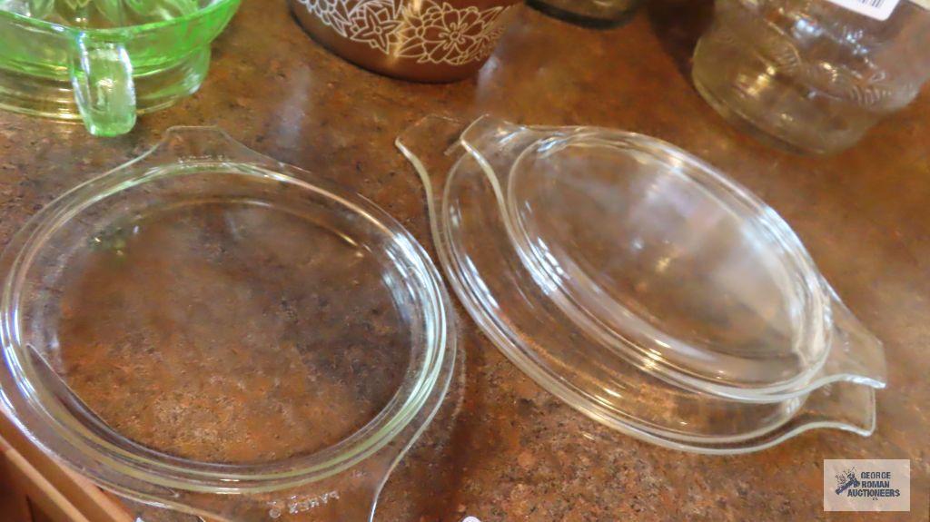 Pyrex three-piece brown casserole set with glass lids