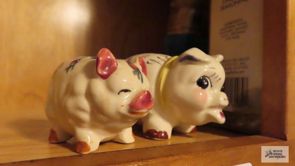 Two piggy banks, one marked Japan