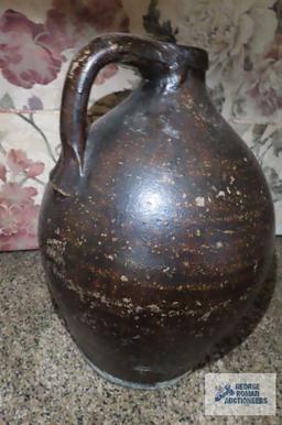 Antique jug with handle