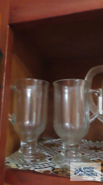 Glass pitcher, mugs, and salt and pepper shakers
