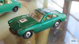 Ferrari Berlinetta, Studebaker, and other car made in England by Lesney