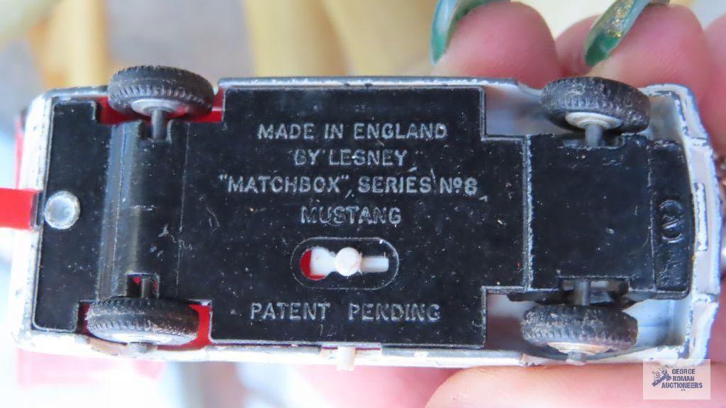Six cars made in England by Lesney, some missing pieces