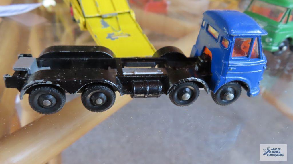 Two tilt cab "IMPY" trucks made in England