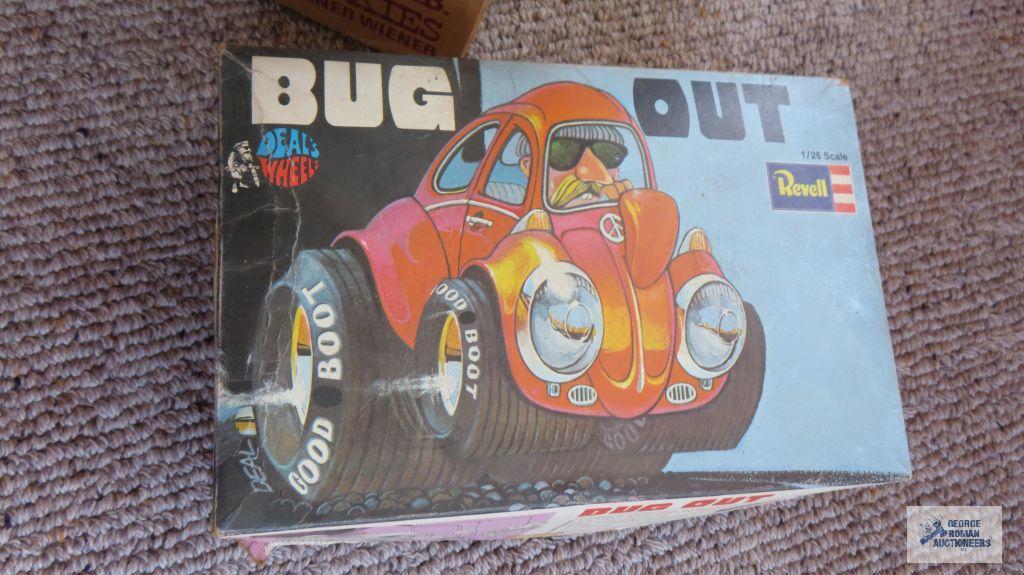 Revell Bug Out model box, model pieces, and other toy pieces in box