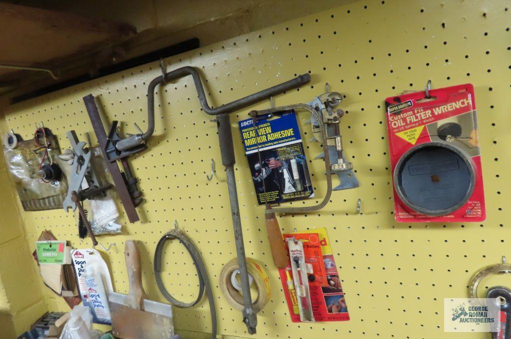tools, hardware and etc on pegboard