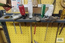 lot of screwdrivers and pliers
