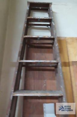 wooden 10 ft step ladder in garage