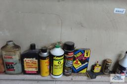 lot of oils, sprays, gardening tools and etc