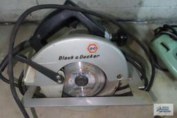 Black & Decker circular saw with drills and 12 volt drop light