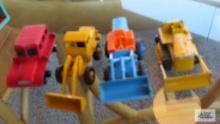 Snow-trac, tractor shovel,...caterpillar, and tractor,...made in England by Lesney, some missing tra