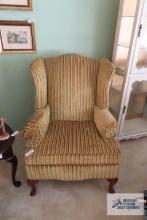 Pair of gold stripe wingback chairs by Halligan