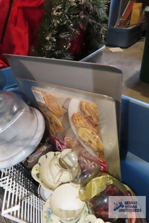 lot of assorted dishes, glass cutting boards, broiler pan and etc