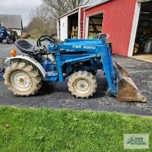 Ford 1200 diesel tractor with Ford 768 loader attachment. Showing 758 hours. Welded hook on bucket.