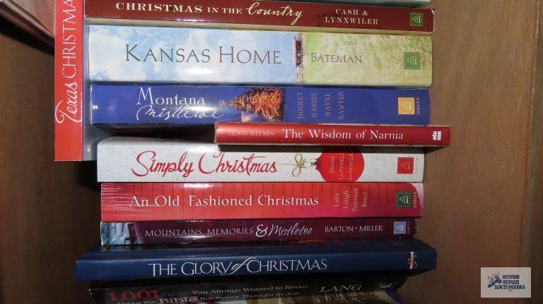 Three shelves of assorted books, craft, Christmas, cookbooks, bears, cros stitch, crochet