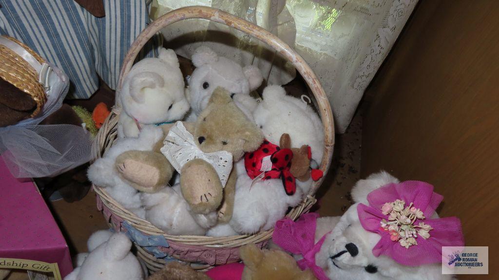Large assortment of teddy bears and rabbits on a bench