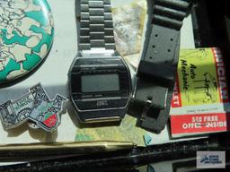Miscellaneous items, including watches and Saint Patrick's Day pin