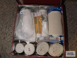 Tin of first aid items