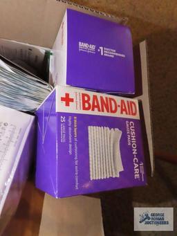 Tin of first aid items