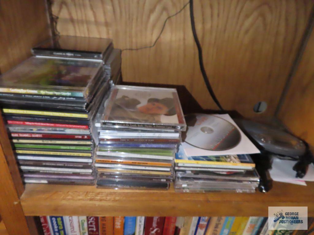 Lot of assorted CDs and CD player