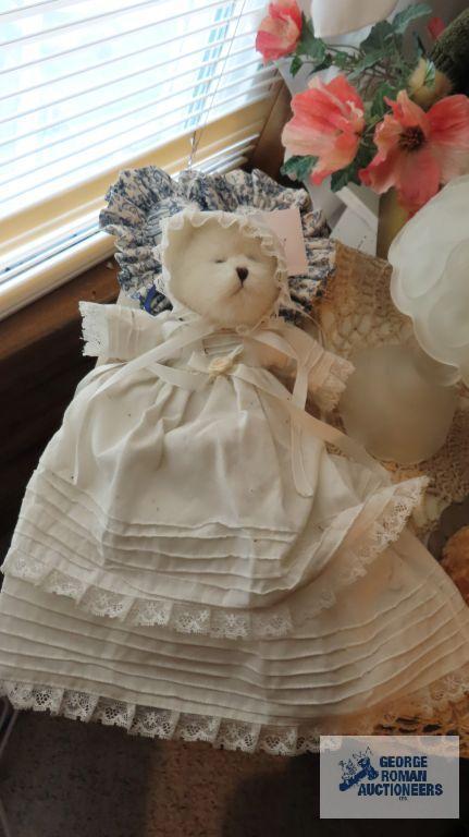 Miscellaneous items including Teddy bears, floral arrangement, candle holder, miniature baby with