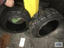 (2) NEW AND (2) USED FORKLIFT WHEELS