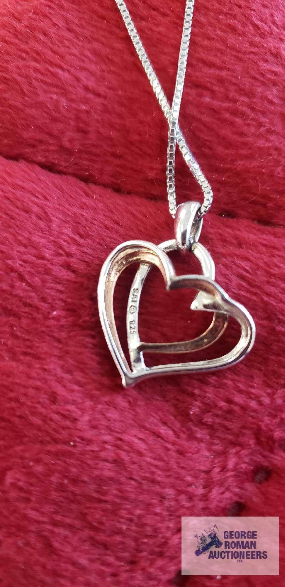 Two tone heart-shaped pendant, marked 925, on silver colored box chain, marked 925, total