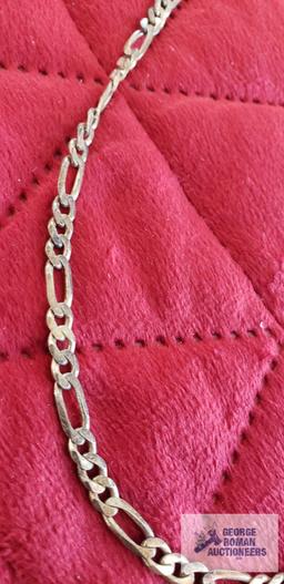 Silver colored long link necklace, marked 925 Italy, approximate total weight is 27.65 G
