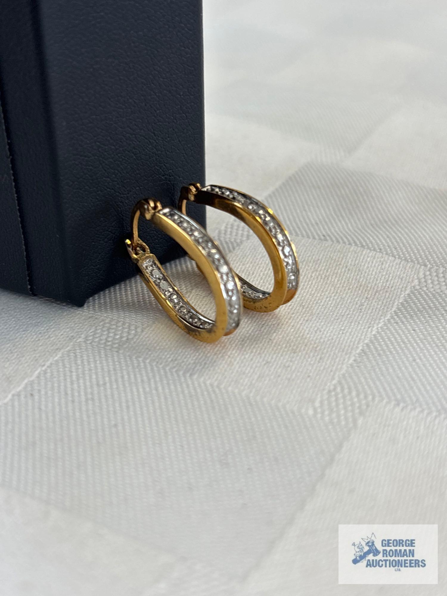 Pair of gold colored hoop earrings, marked 925