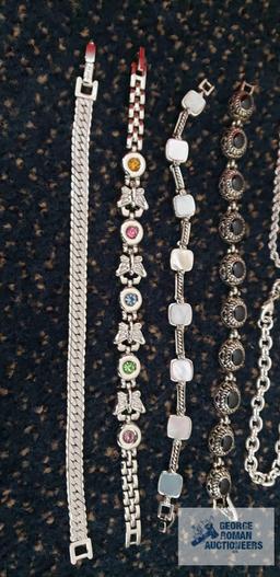 Silver colored costume jewelry bracelets