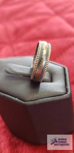 Silver colored band ring, marked Sterling, approximate total weight 3.16 G
