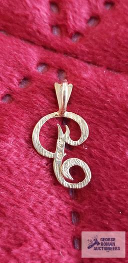 Gold colored "P" pendant, marked 14K, approximate total weight is .58 G