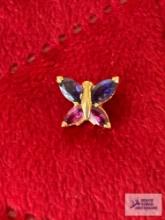 Purple and pink gemstone butterfly pendant, marked 14K, approximate total weight is 1.35 G