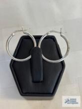Silver colored hoop earrings, marked 925, approximate total weight is 1.79 G