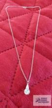 Silver color chain...with bead like pendant, marked sterling