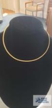 Serpentine two-sided, one gold colored, one silver colored, necklace, marked 14KT Italy, total