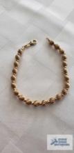 Gold colored bead...bracelet, marked 14K 585, approximate total weight is 2.27 G