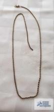 Gold colored rope chain, clasp is not attached, will need repaired, marked 14K, approximate total