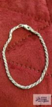 Silver colored rope bracelet, marked 925 Italy, approximate total weight is 4.74 G
